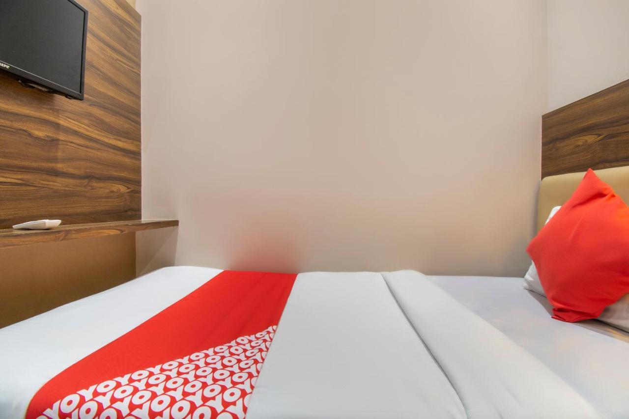 Oyo 69377 Hotel Ruby Mumbai Bagian luar foto